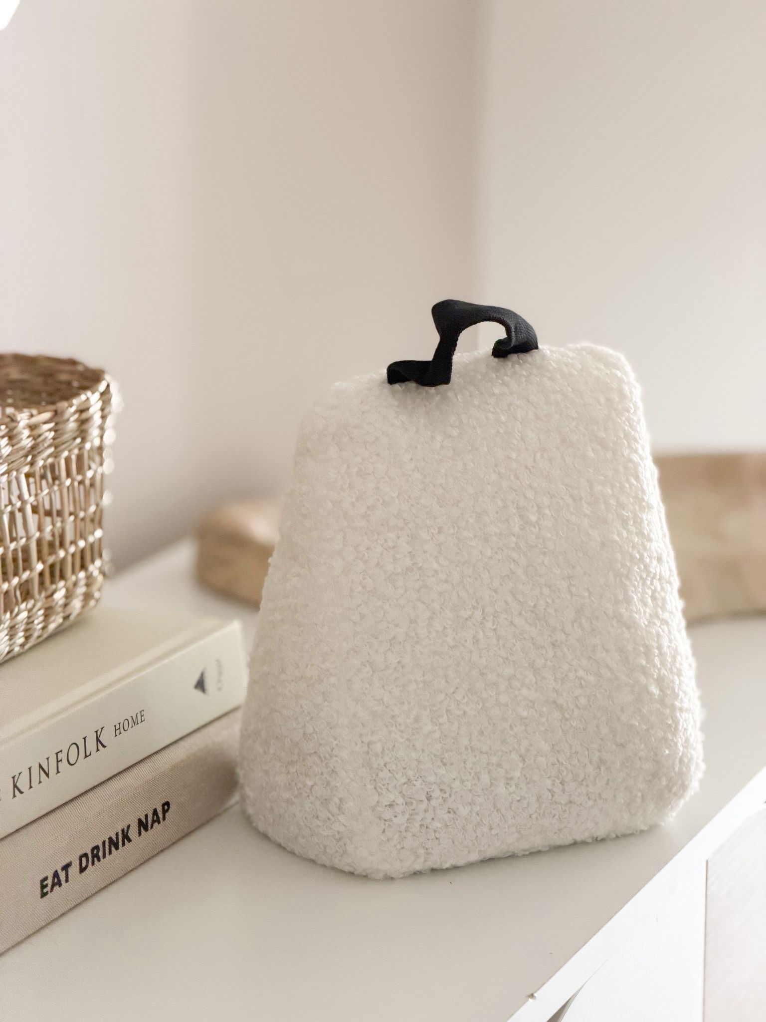 Cream boucle door stop with handle