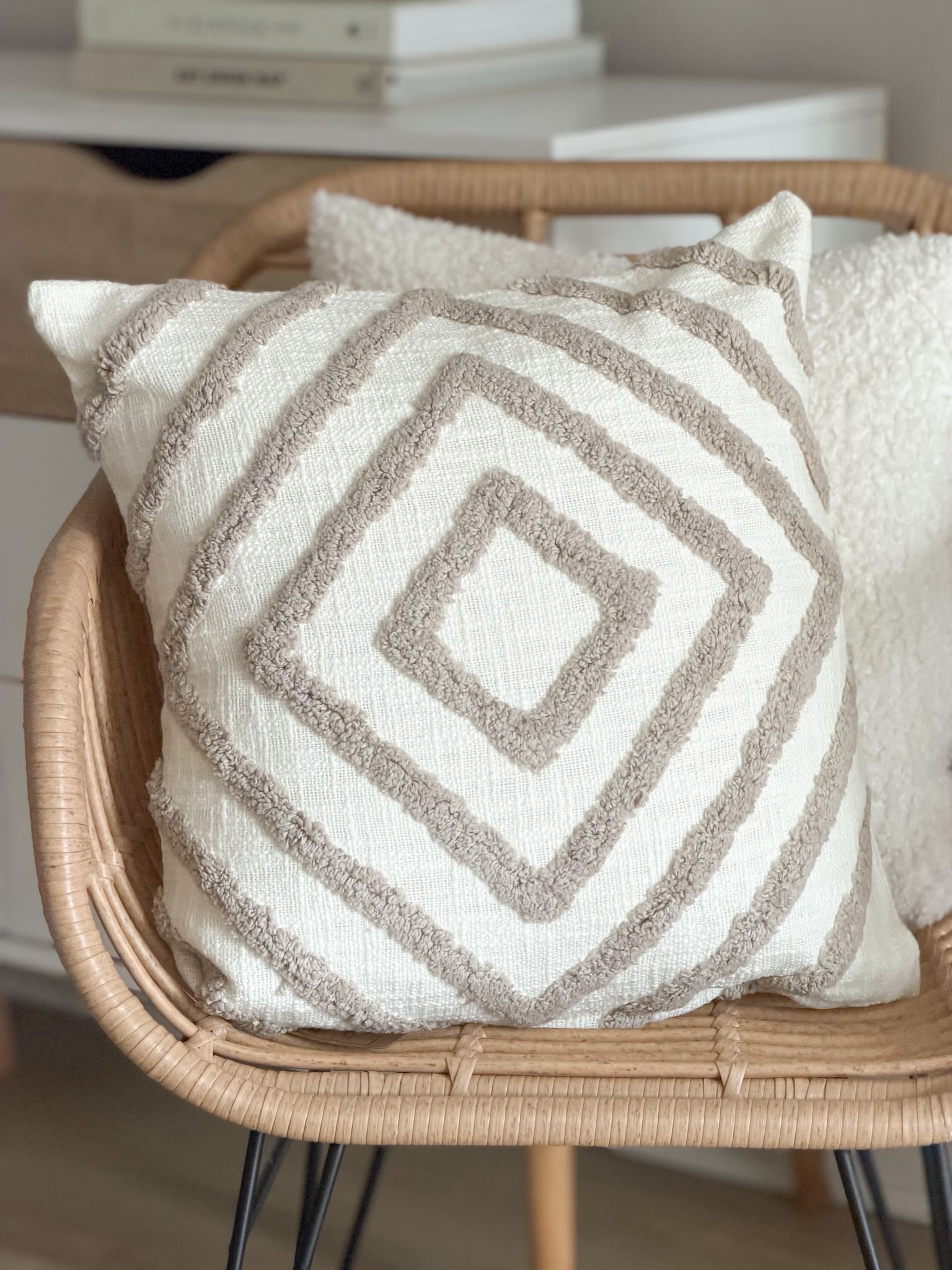 Tufted textured taupe cushion