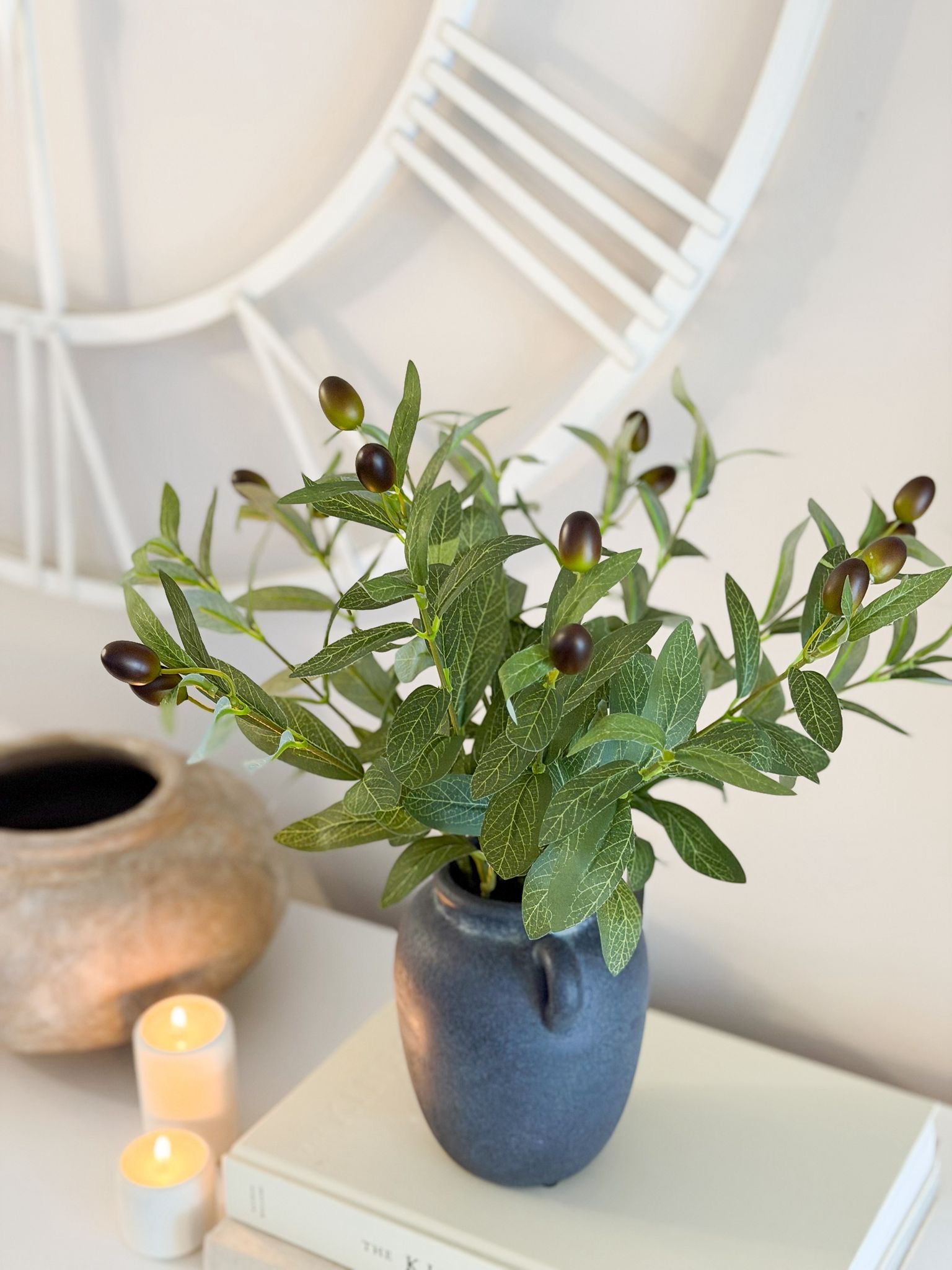 Faux olive tree in rustic style handled pot
