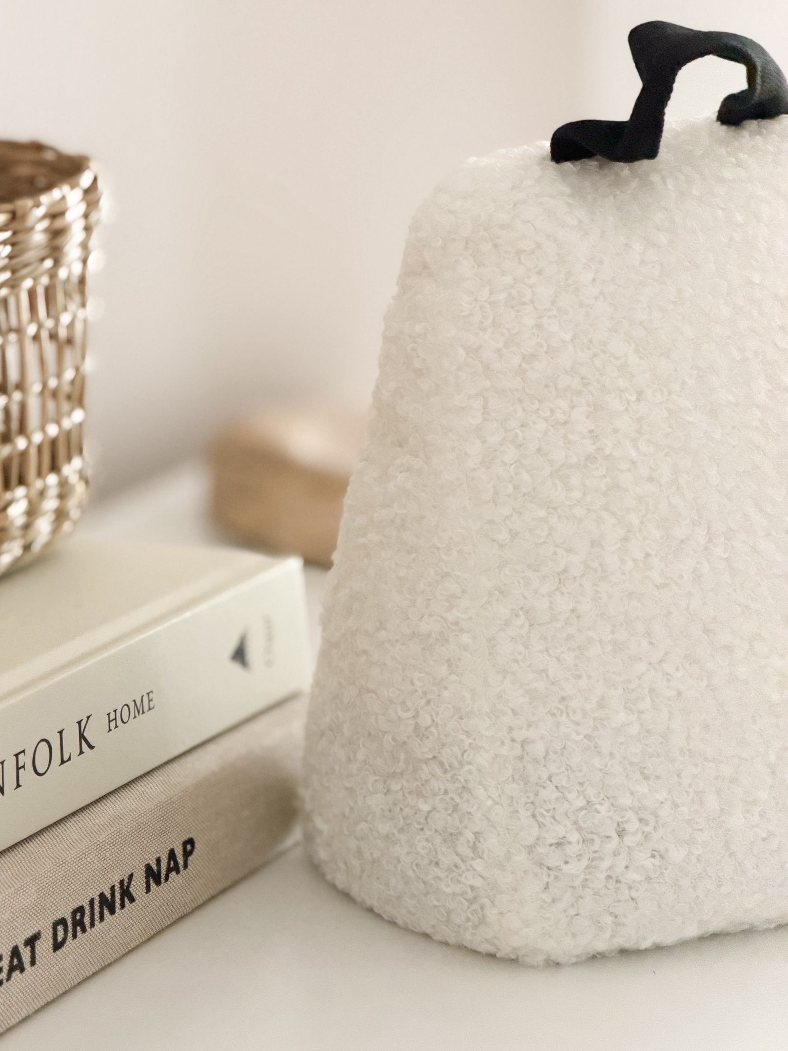 Cream boucle door stop with handle