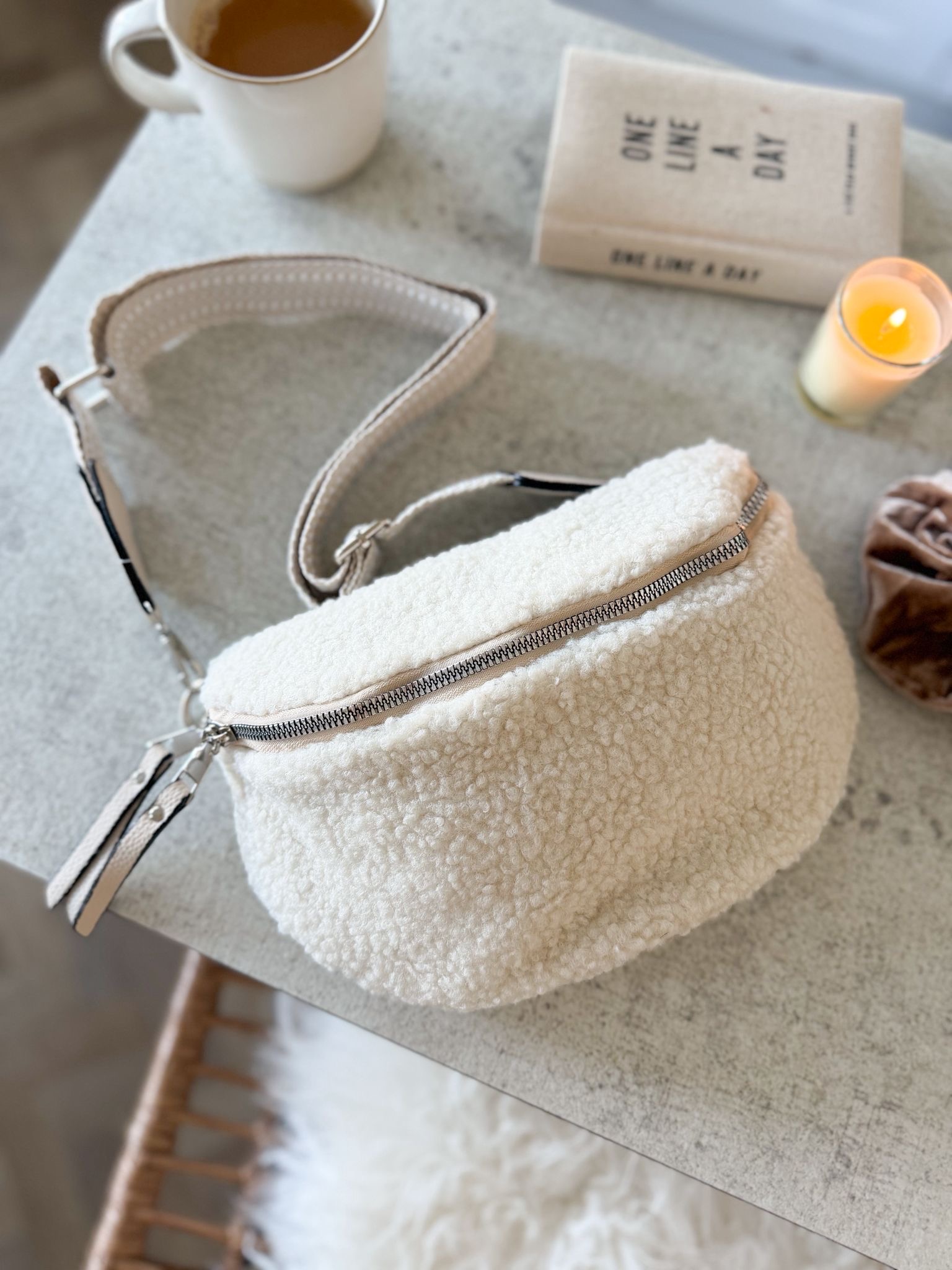 Boucle teddy cross body bag in cream with herringbone strap