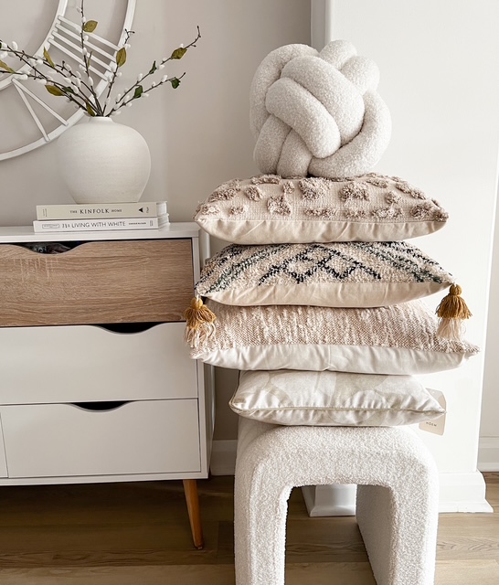 Large cream Nordic boucle knot cushion