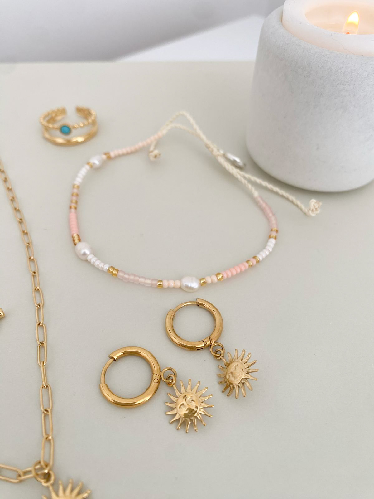Sun charm earrings