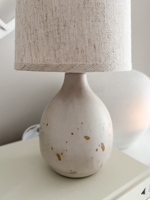 Natural ceramic ‘flecked’ lamp with linen shade