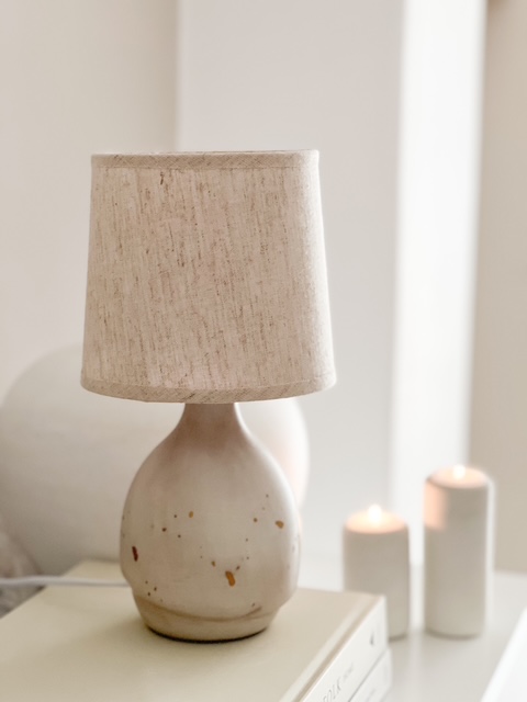 Natural ceramic ‘flecked’ lamp with linen shade