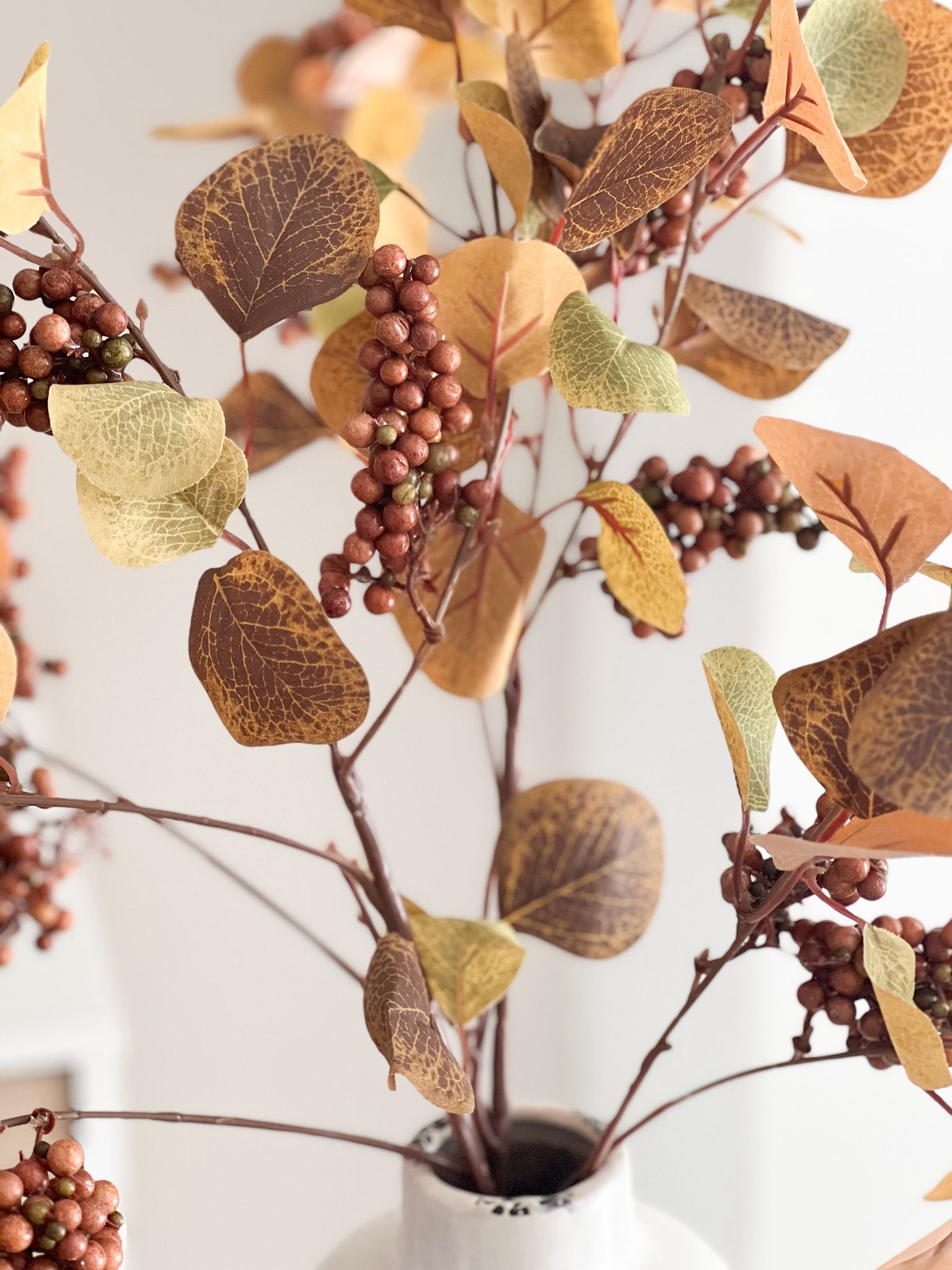 Autumnal foliage stem with faux berries