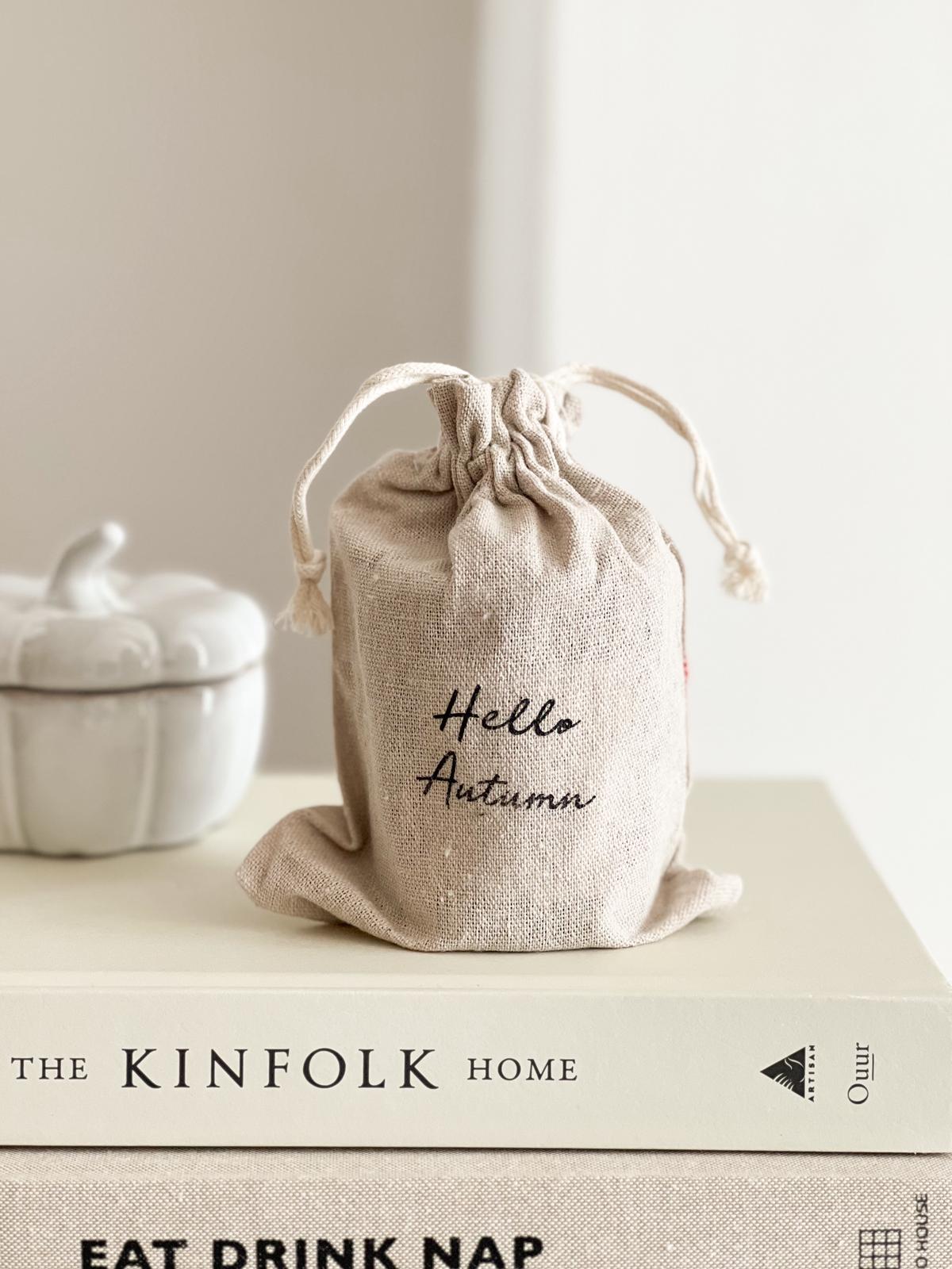 Hello Autumn scented candle in hessian bag