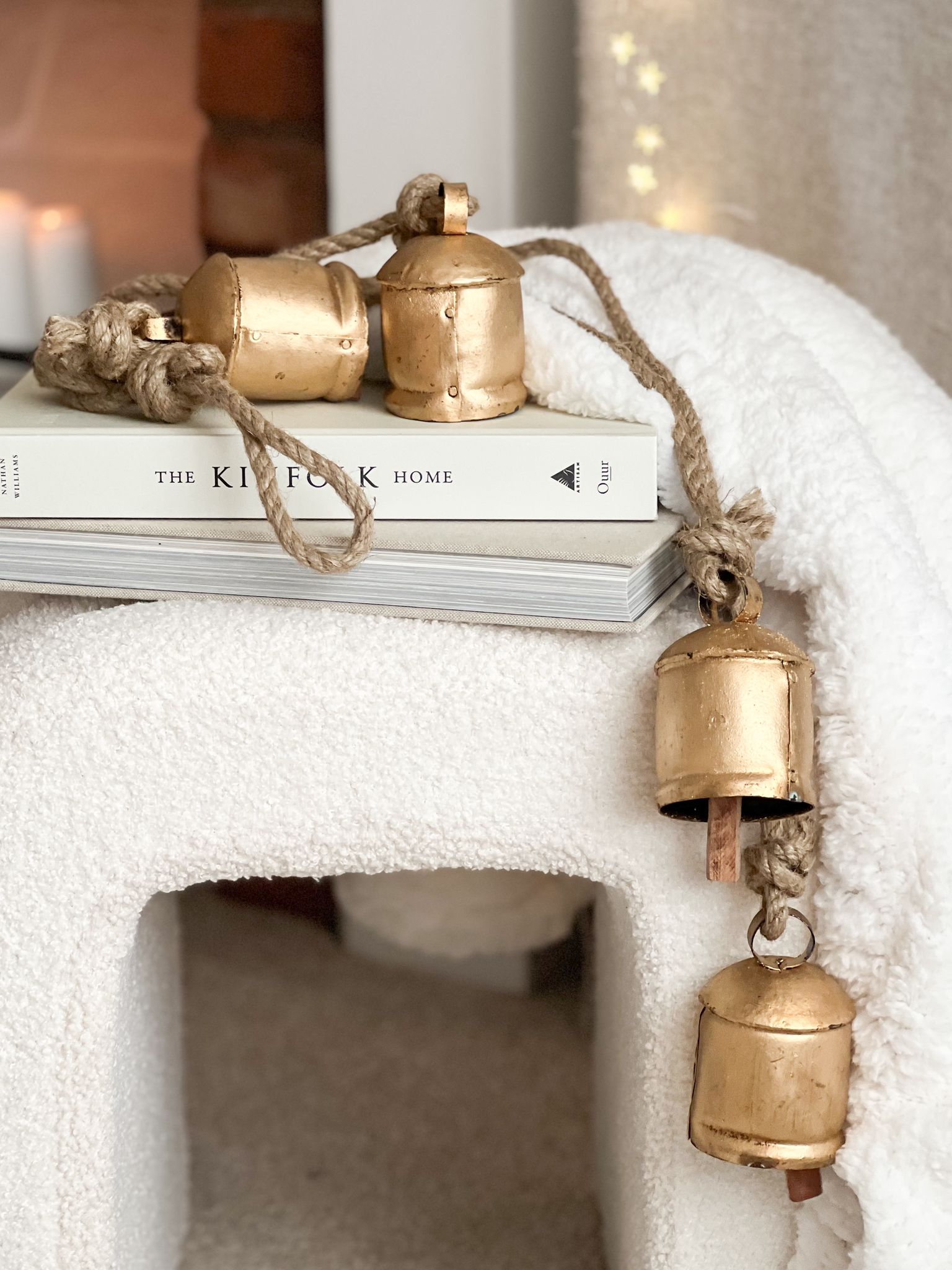 Four vintage style bells on hanging rope