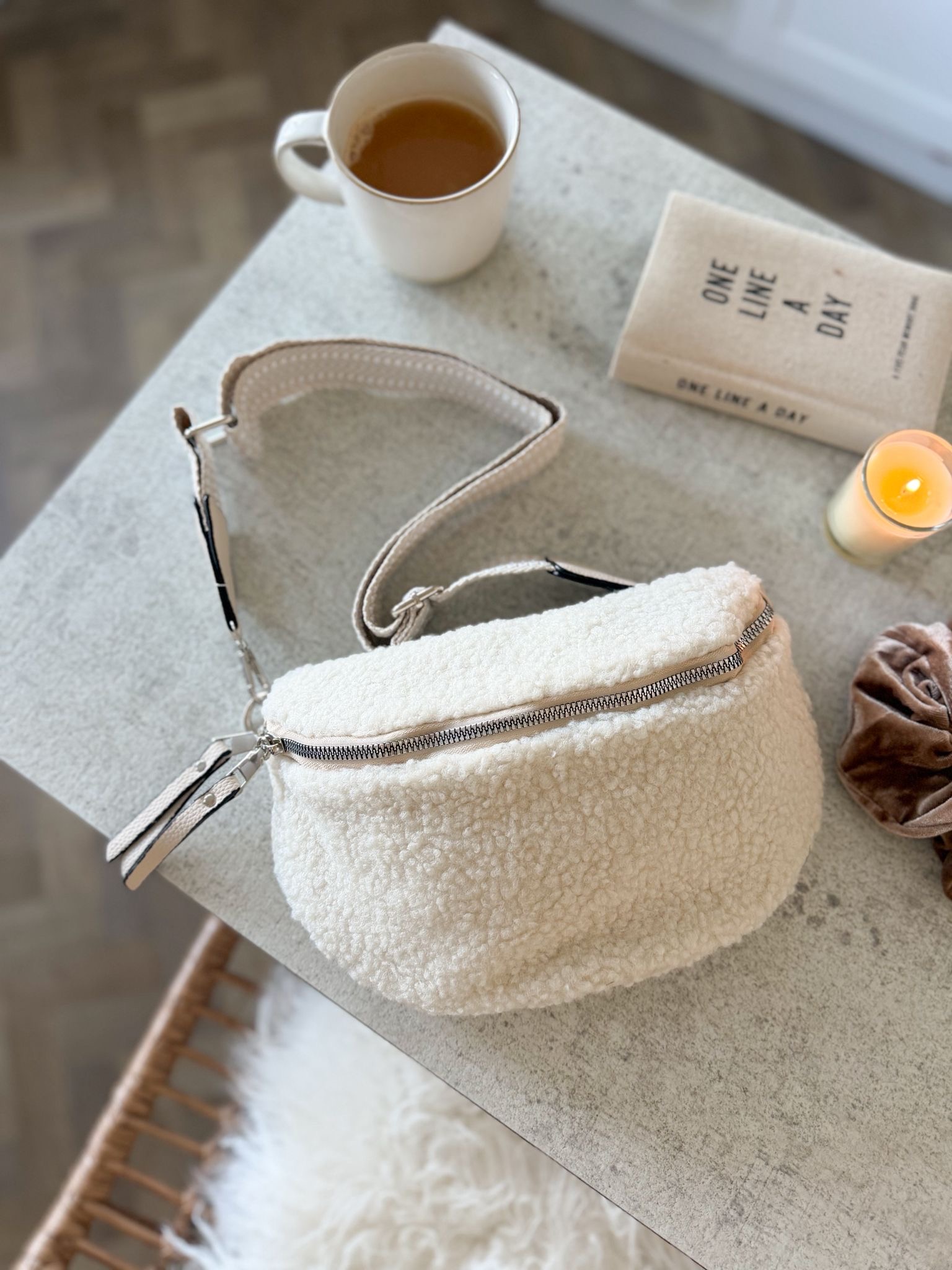 Boucle teddy cross body bag in cream with herringbone strap