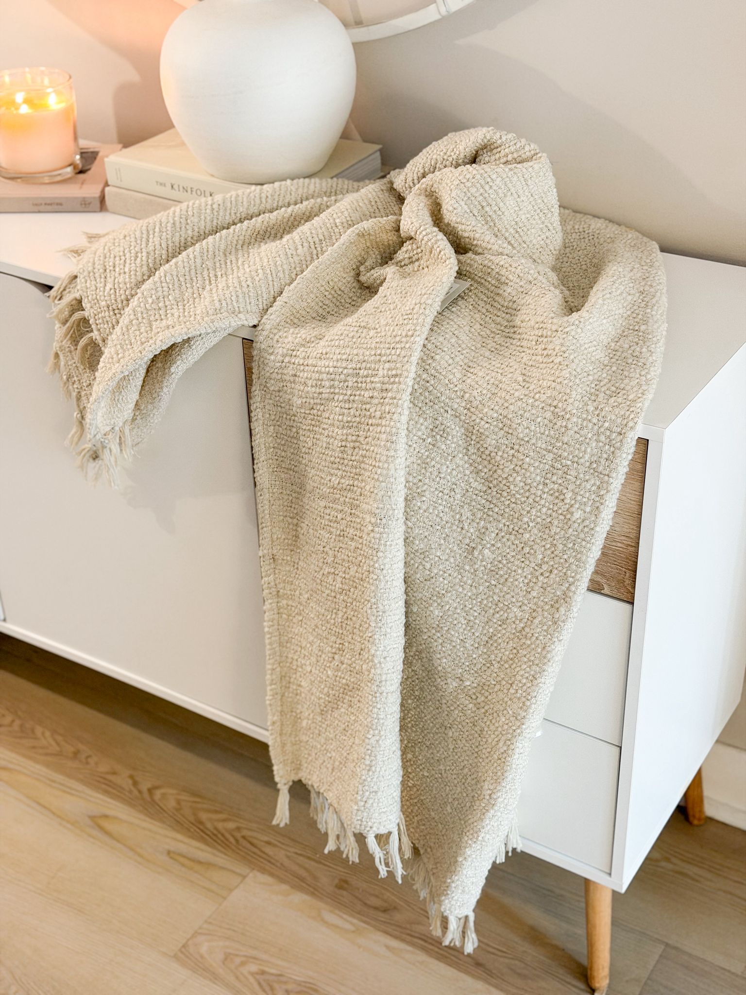 Textured tassel boucle throw in ecru