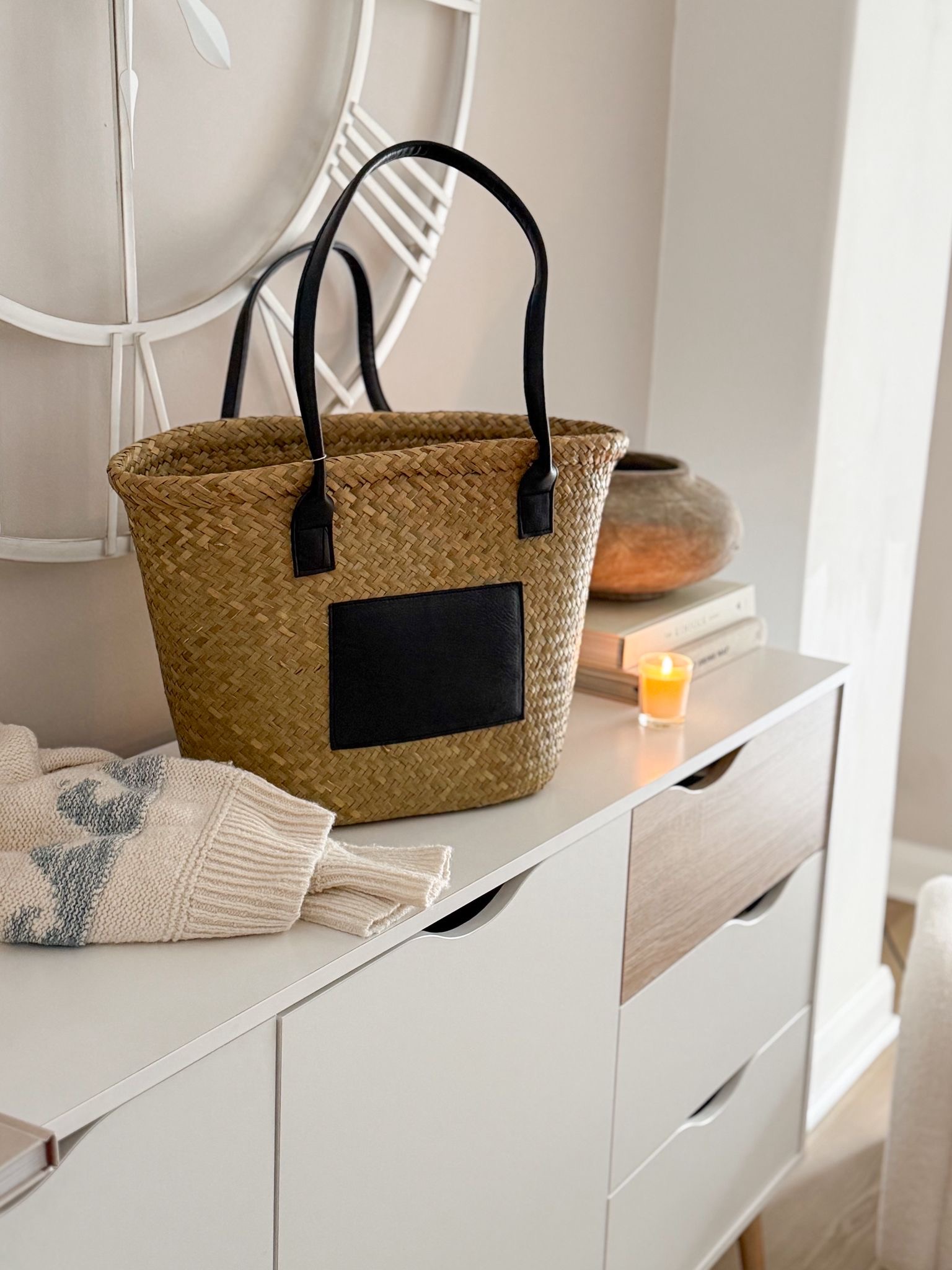 Seagrass basket bag with matt black panel and handles