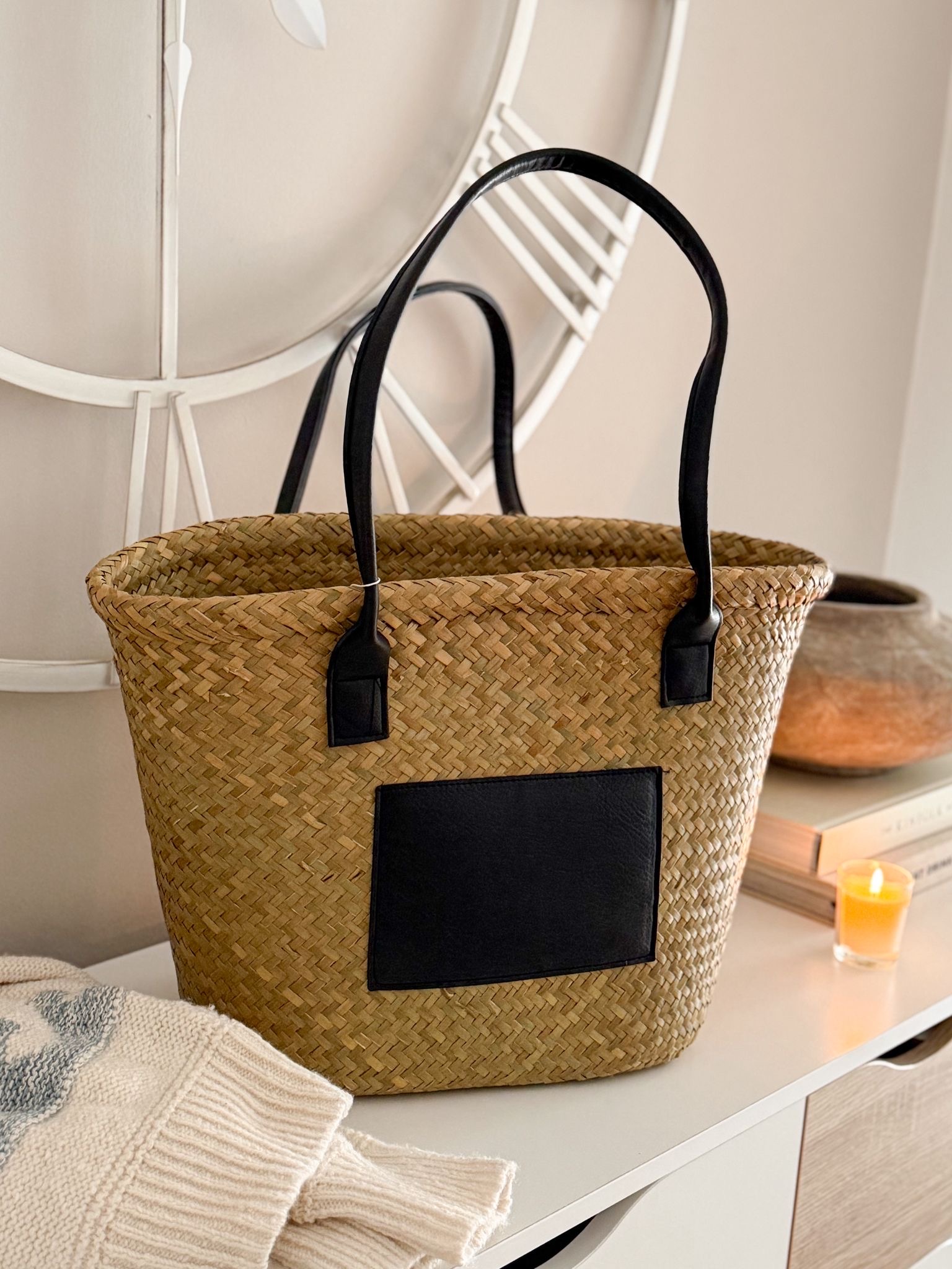 Seagrass basket bag with matt black panel and handles