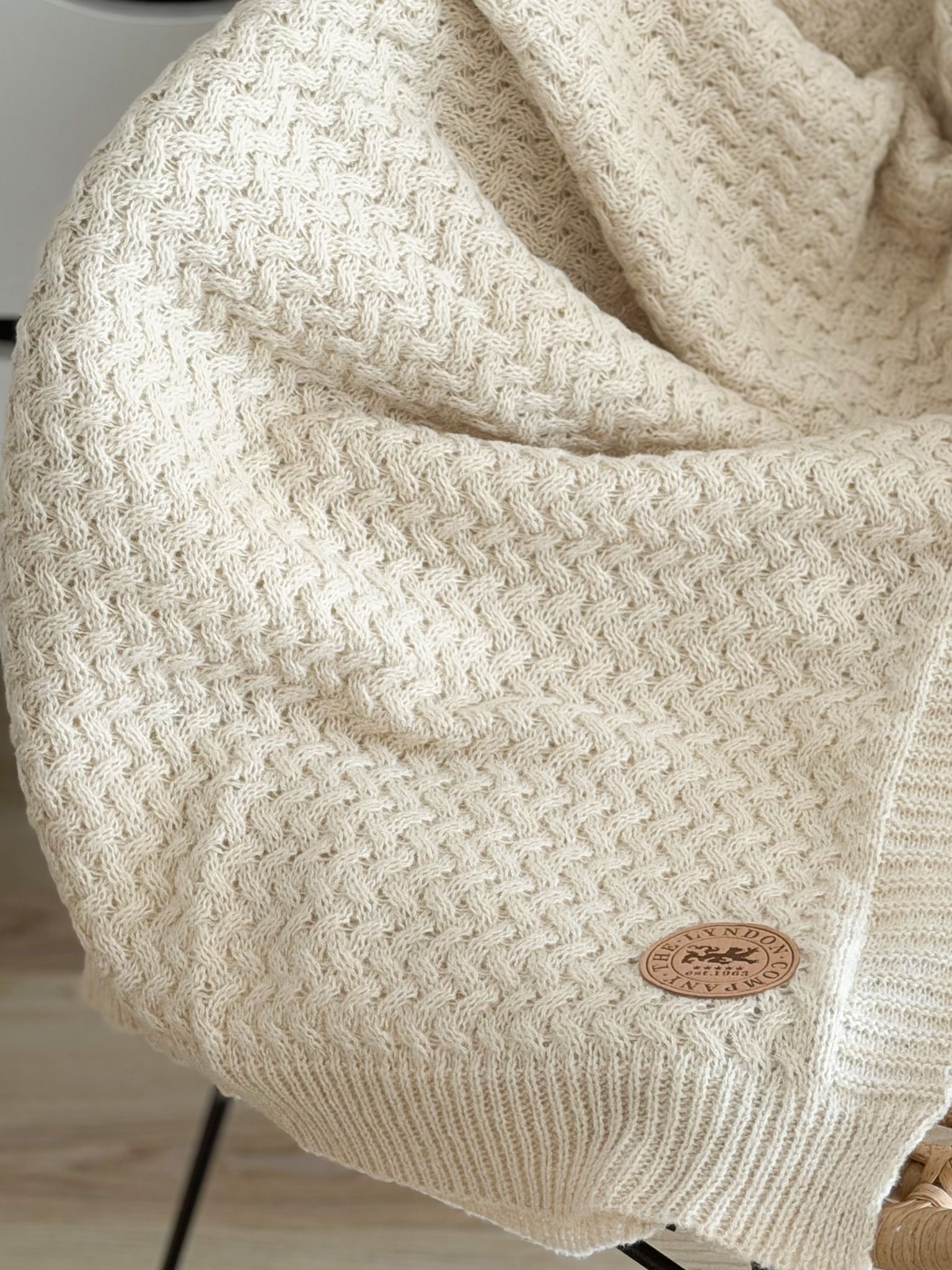 Quality knitted blanket throw in cream