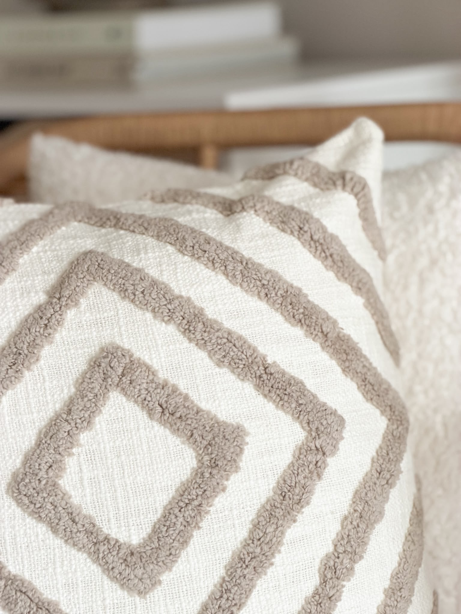 Tufted textured taupe cushion