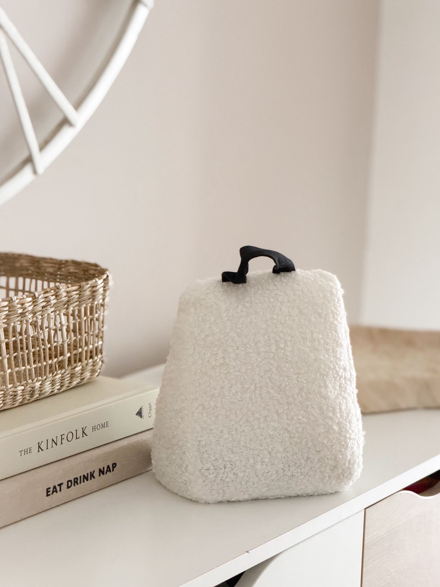 Cream boucle door stop with handle