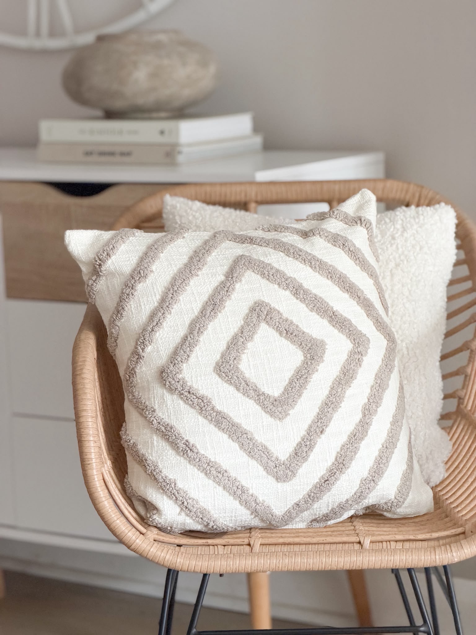 Tufted textured taupe cushion