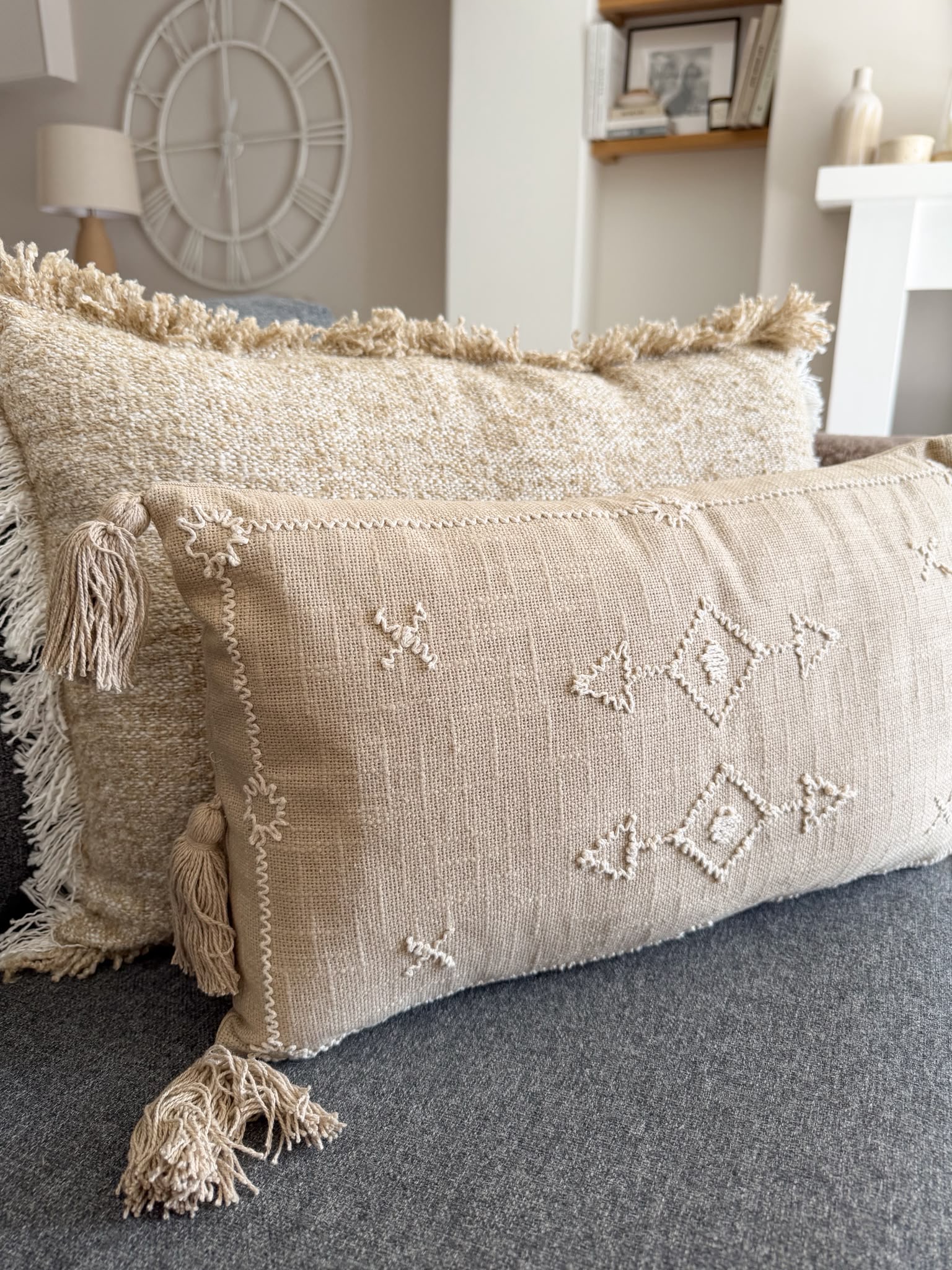 Decorative stitch stone cushion with tassels