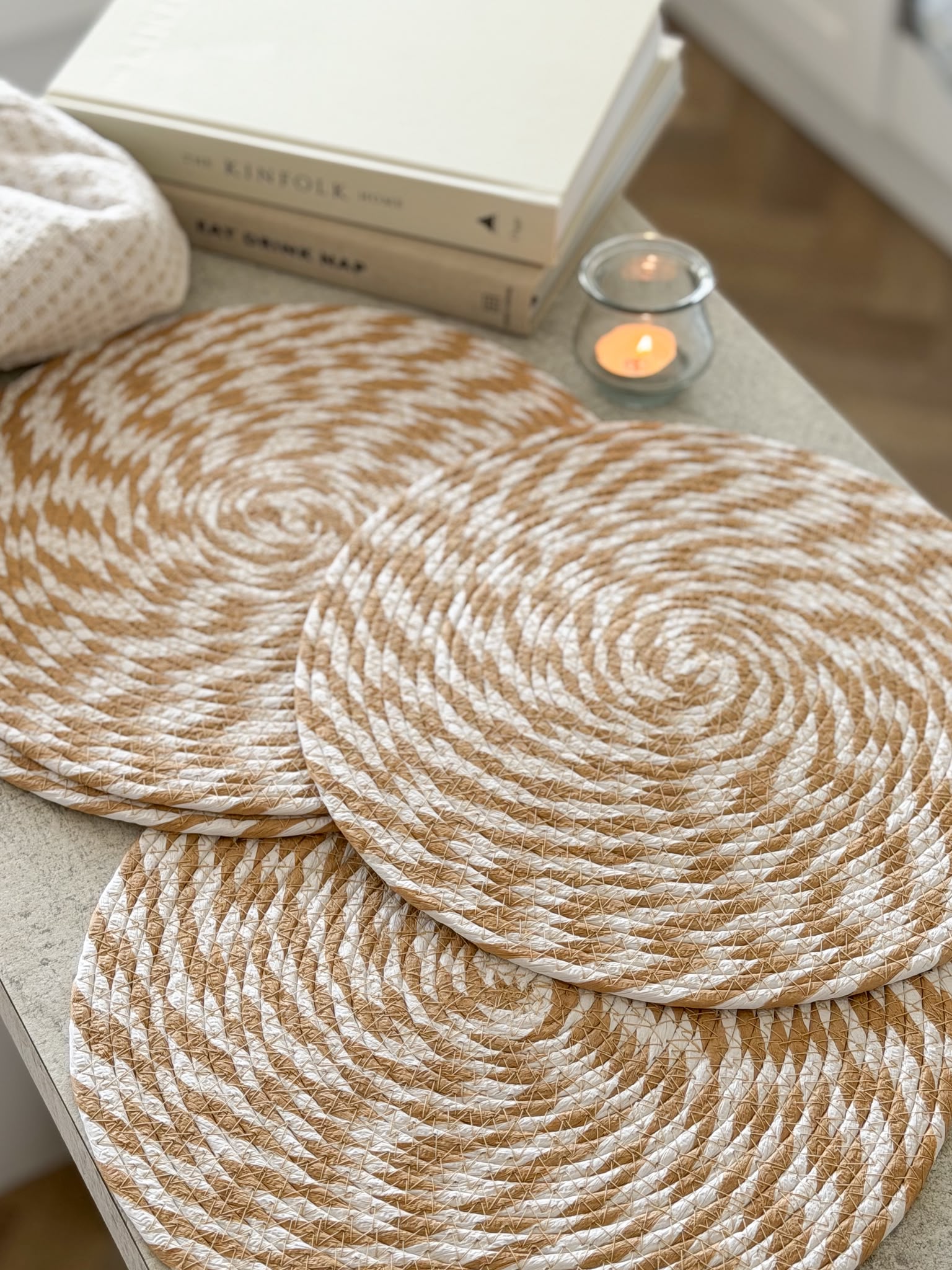 Set of four natural & white woven placemats